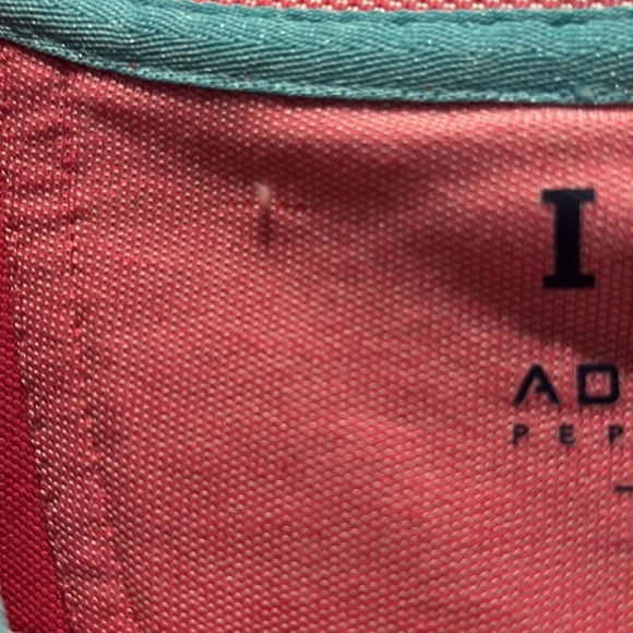 Men’s polo golf shirt- pinkish peach in color. One tiny pull inside near collar - Picture 3 of 6